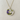 Kindred & Kin Belart Full-Moon Larkspur necklace featuring purple and white pressed flowers in clear resin on a gold chain.