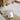 Kindred & Kin Bathorium Eucalyptus Apothecary bath soak pouch with pink clay and essential oils being poured into a warm bath.