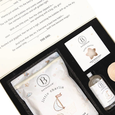Kindred & Kin Bathorium Little Charlie gift set featuring bath soak, bubble bath milk, konjac sponge, and a storybook box.