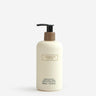 Kindred & Kin Hajjar Blanc Hand & Body Wash in a cream bottle with a wooden accent and pump dispenser. 300ml.