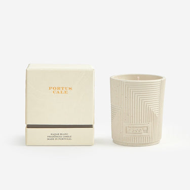 Kindred & Kin Hajjar Blanc scented candle in a speckled matte ceramic vessel with geometric pattern. Oriental woody fragrance.