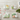 Vista Alegre set of four square porcelain Amazonia coasters featuring vibrant rainforest botanical illustrations.