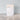 Kindred & Kin Bathorium Ancient Oat Hydration bath soak pouch on a marble tile surface against a light blue wall.