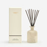 Kindred & Kin Hajjar Blanc fragrance diffuser in a textured ceramic bottle with dark reeds. Includes box.