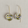 Kindred & Kin Belart  Full-Moon Larkspur earrings featuring preserved purple flowers in clear eco-resin with bronze hooks