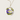 Kindred & Kin/Belart full moon pendant necklace featuring preserved purple and white larkspur petals in clear resin on gold