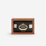Kindred & Kin Ruby Red soap bar with grape seeds for exfoliation, in a fire-engraved wooden box.